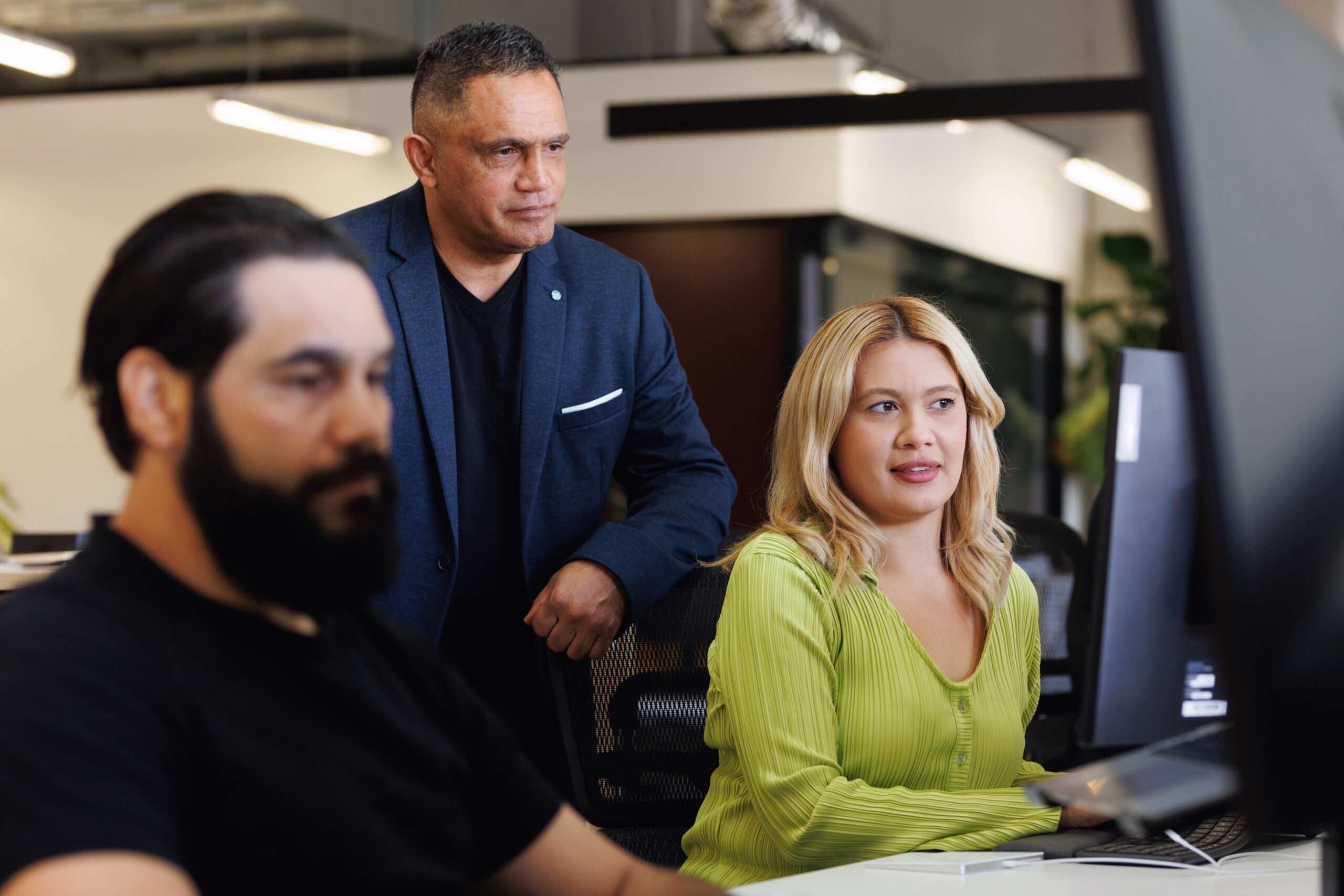 Aboriginal Australian man creative working with team